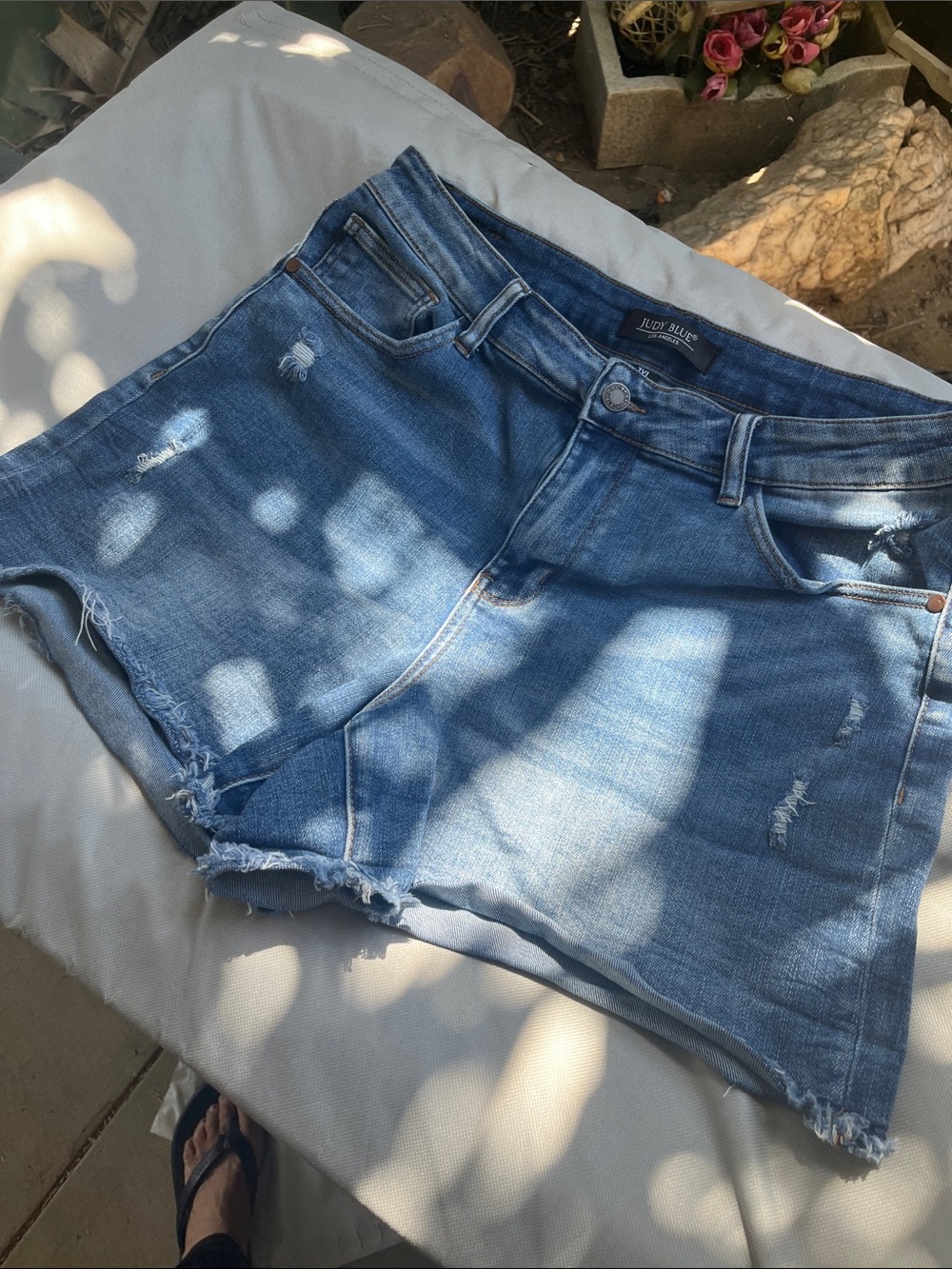 Judy Blue Mid-High Rise Distressed Denim Shorts in Medium Blue